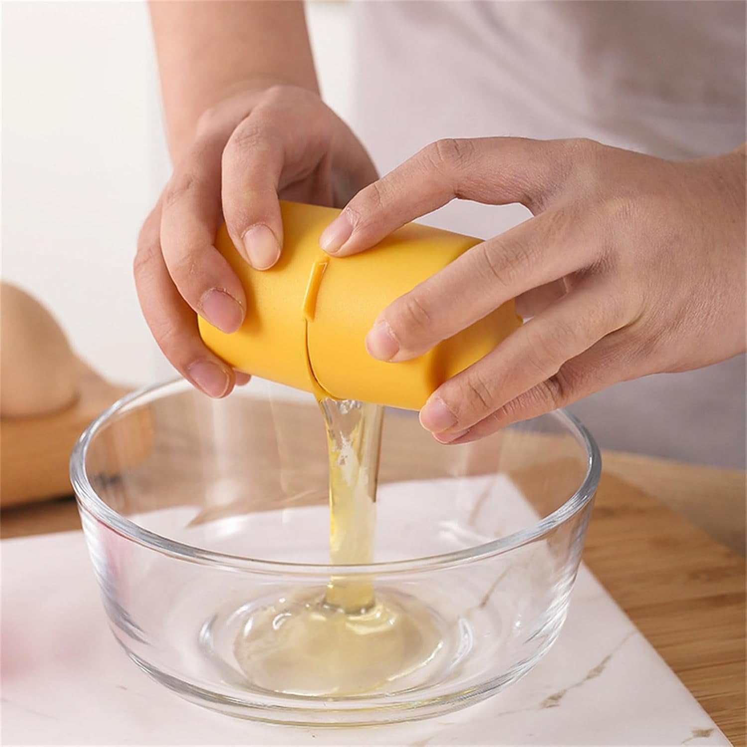 Wukusy handheld egg shell opener and cracker tool for raw eggs, designed for easy shell removal in home and kitchen use