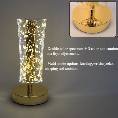 Elegant Wukusy luxury golden crystal LED table lamp with a sleek design and warm lighting, perfect for stylish home decor.