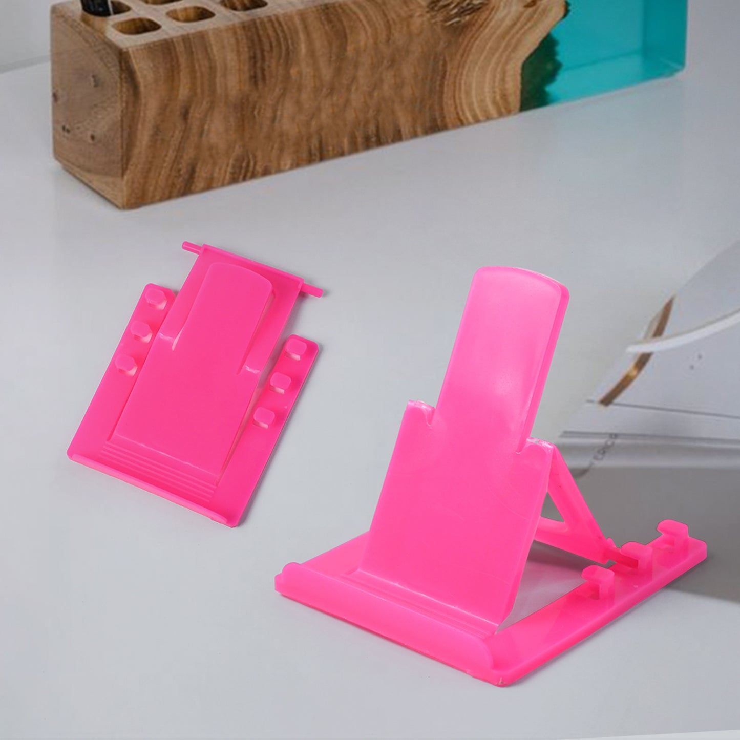 Wukusy adjustable foldable plastic mobile phone stand holder displaying a phone in a stable upright position