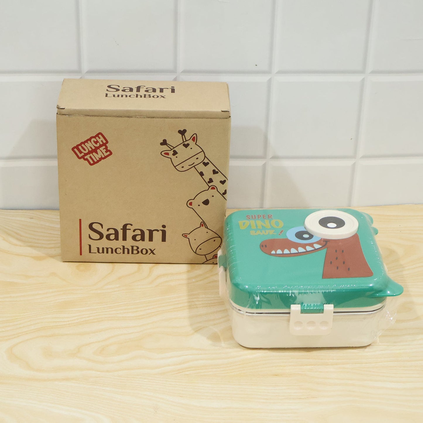 Steel kids dinosaur lunch box set by Wukusy with bento container, steel tray, spoon, and sauce cup for children.