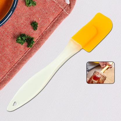 Wukusy silicone cooking spatula for baking, 19 cm, flexible kitchen tool with a bright red handle and silicone head for non-stick cookware.