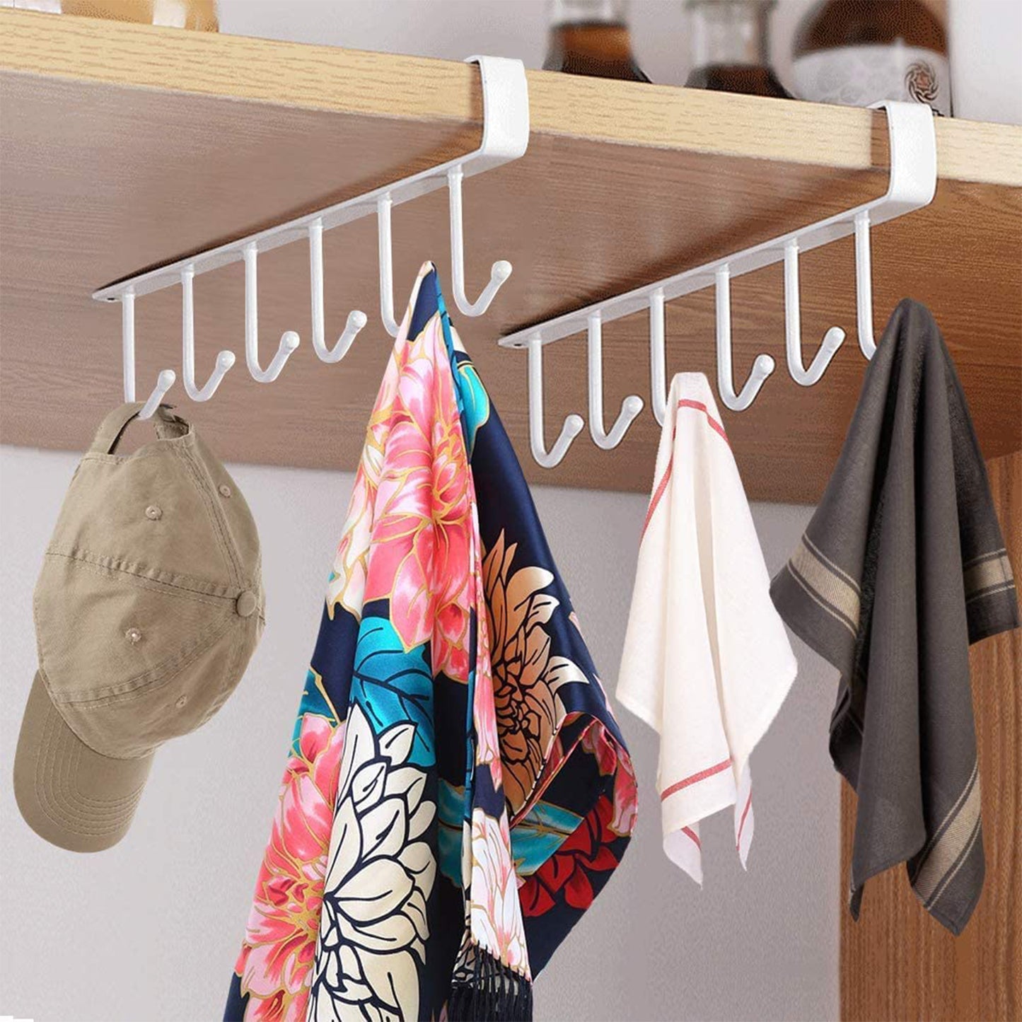 Small Wukusy metal multifunctional cabinet storage rack with multiple shelves for home organization and kitchen use.