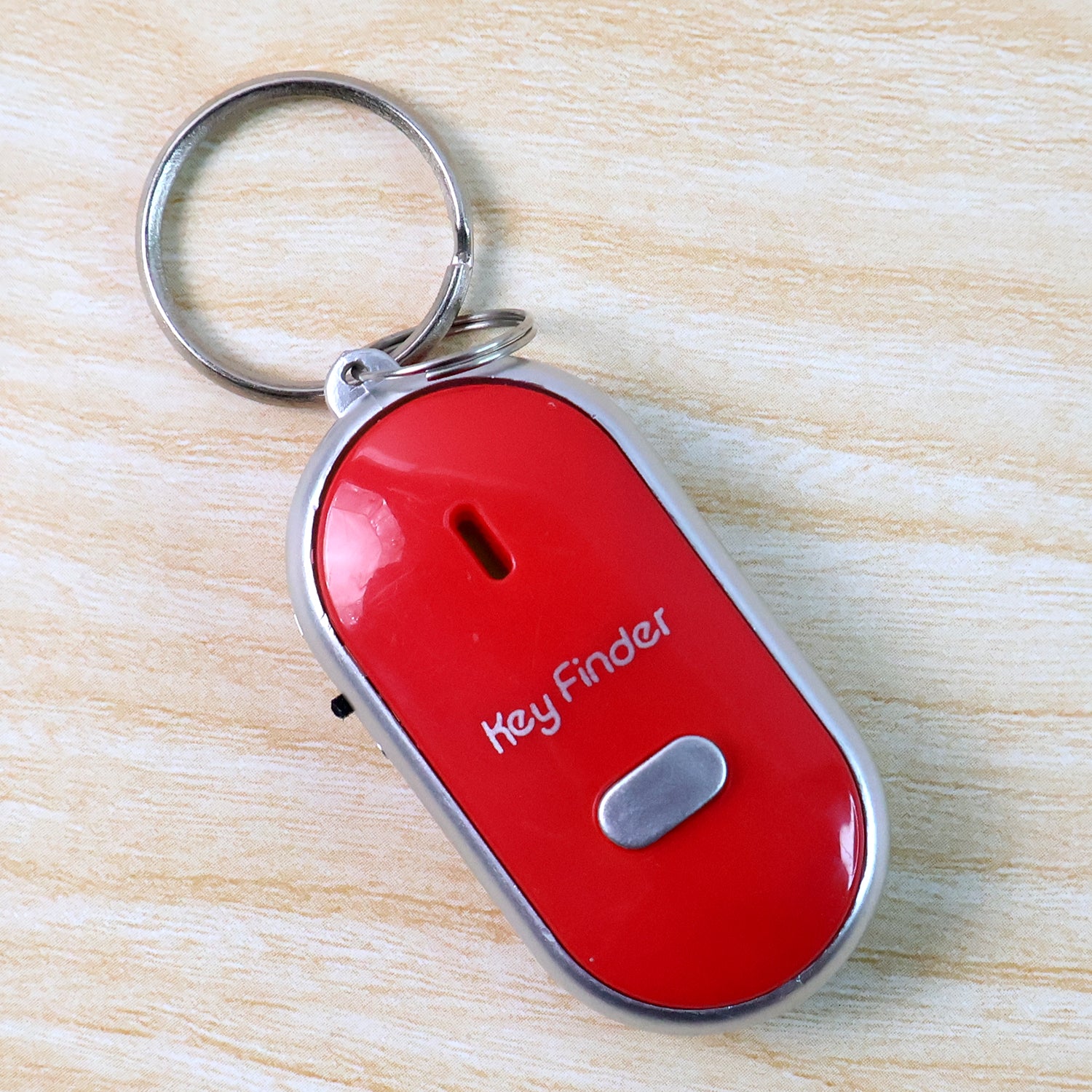 Wukusy key finder key chain with whistle and induction feature, designed to help locate lost keys easily.