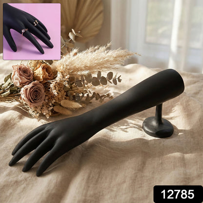 Black hand-shaped jewelry display stand by Wukusy, showcasing rings and bracelets on a sleek, elegant jewelry organizer.