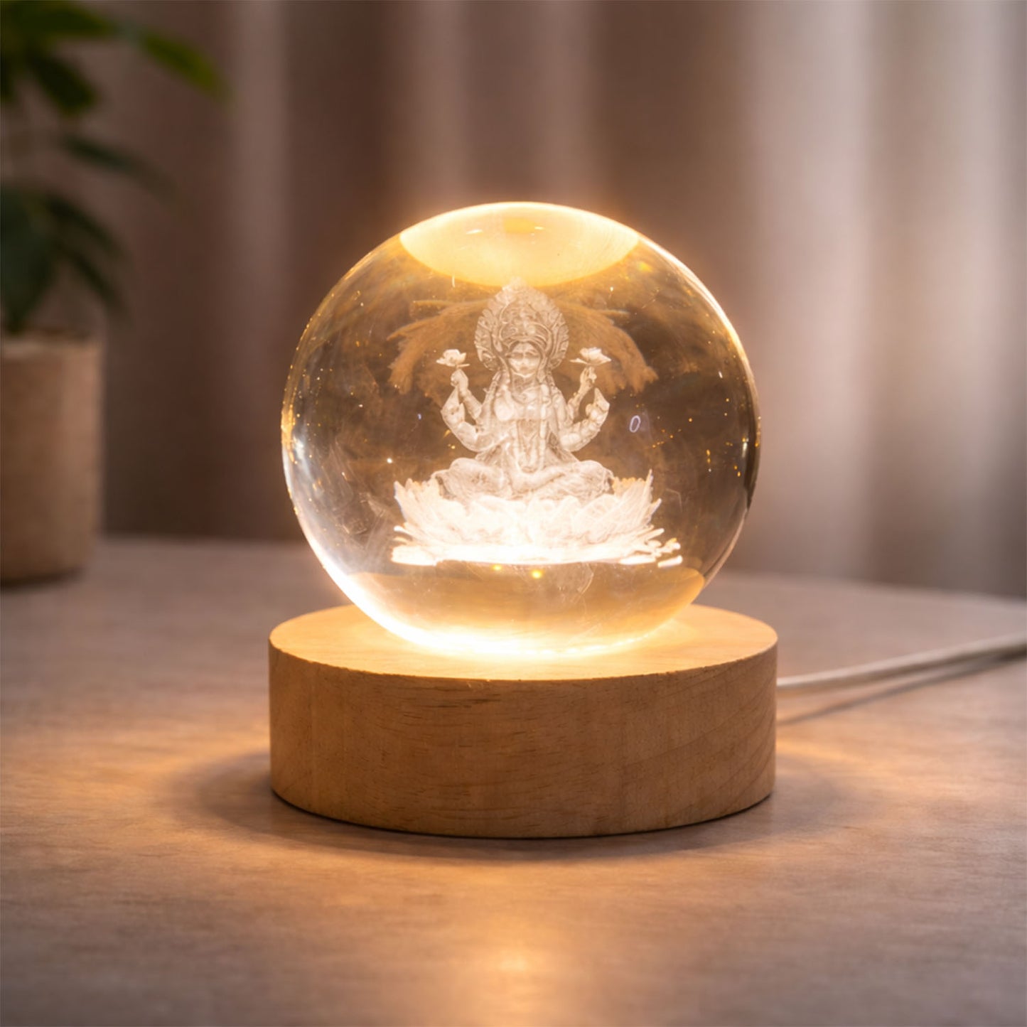 3D crystal Lakshmi ball LED night lamp with wooden base by Wukusy, featuring intricate Lakshmi design and soft ambient lighting.