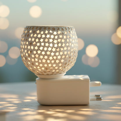 Wukusy star-shaped glass aroma diffuser night lamp with plug-in design, showcasing a sleek, illuminated star cut glass surface.