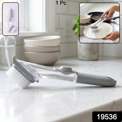Refillable Wukusy soap dispensing dish scrub brush with ergonomic handle for kitchen cleaning, shown with soap dispensing feature.