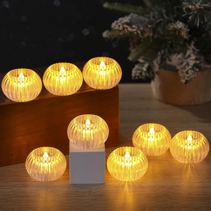 Set of 12 Wukusy LED crystal-effect flameless decorative candles for home decor, with glowing, smokeless, and flickering candle design.