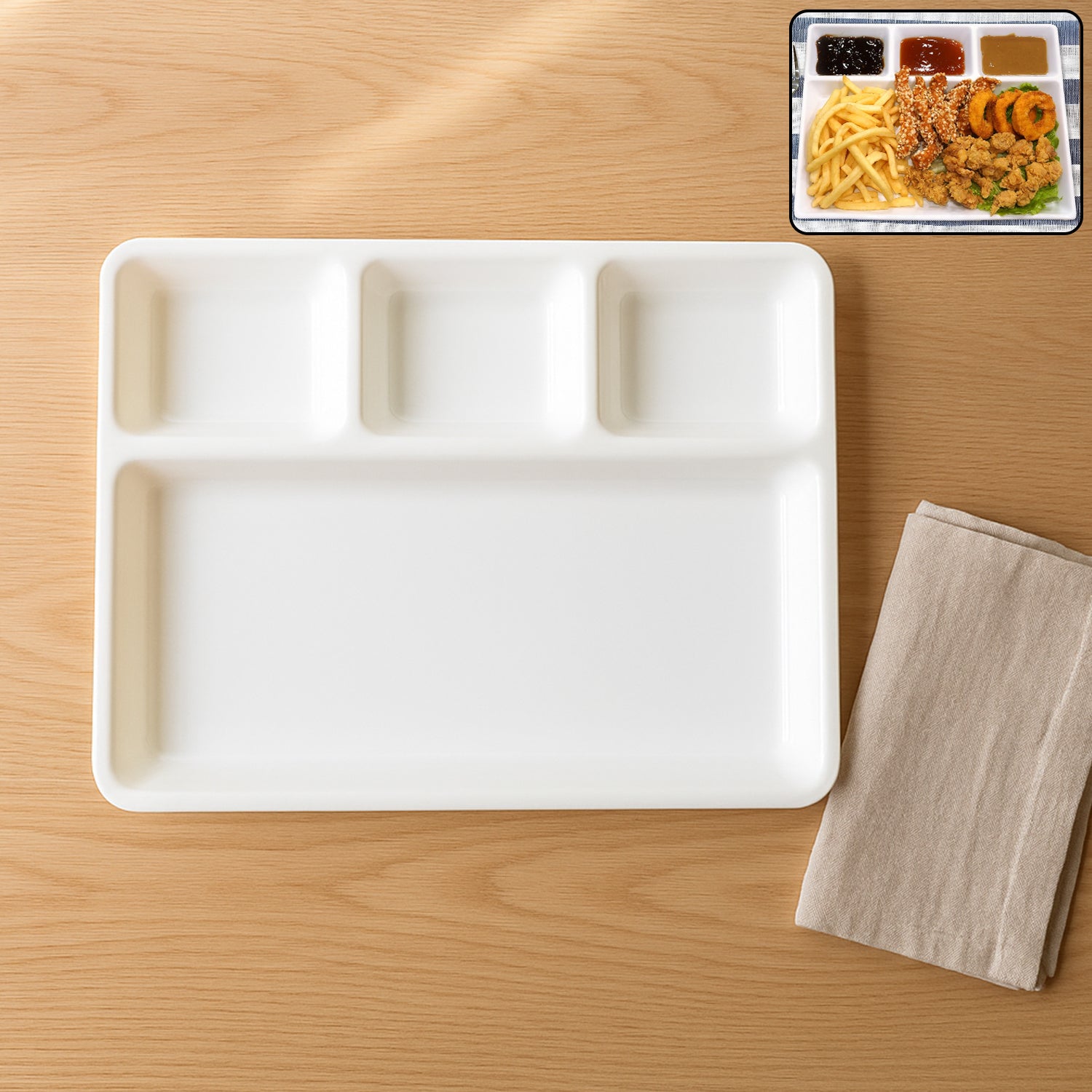 White plastic 4-compartment rectangular meal serving tray from Wukusy, ideal for home and kitchen use, with four sections for different foods.
