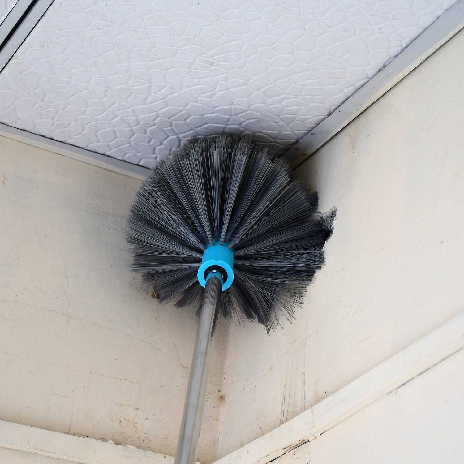 Wukusy cobweb brush with stainless steel extendable handle for cleaning ceiling webs, lights, fans, and hard-to-reach areas at home.