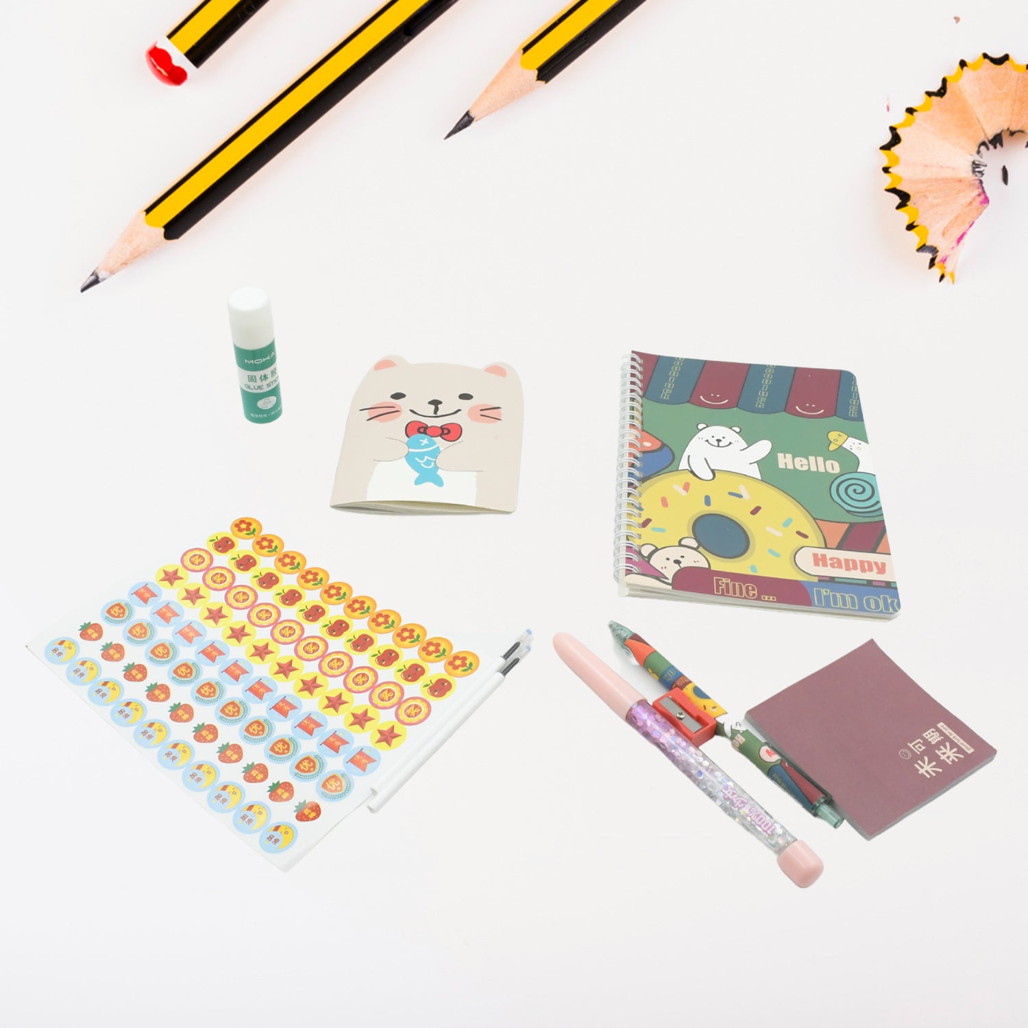Cartoon stationery box by Wukusy with school supplies including pens, eraser, sharpener, stickers, and diary for students.