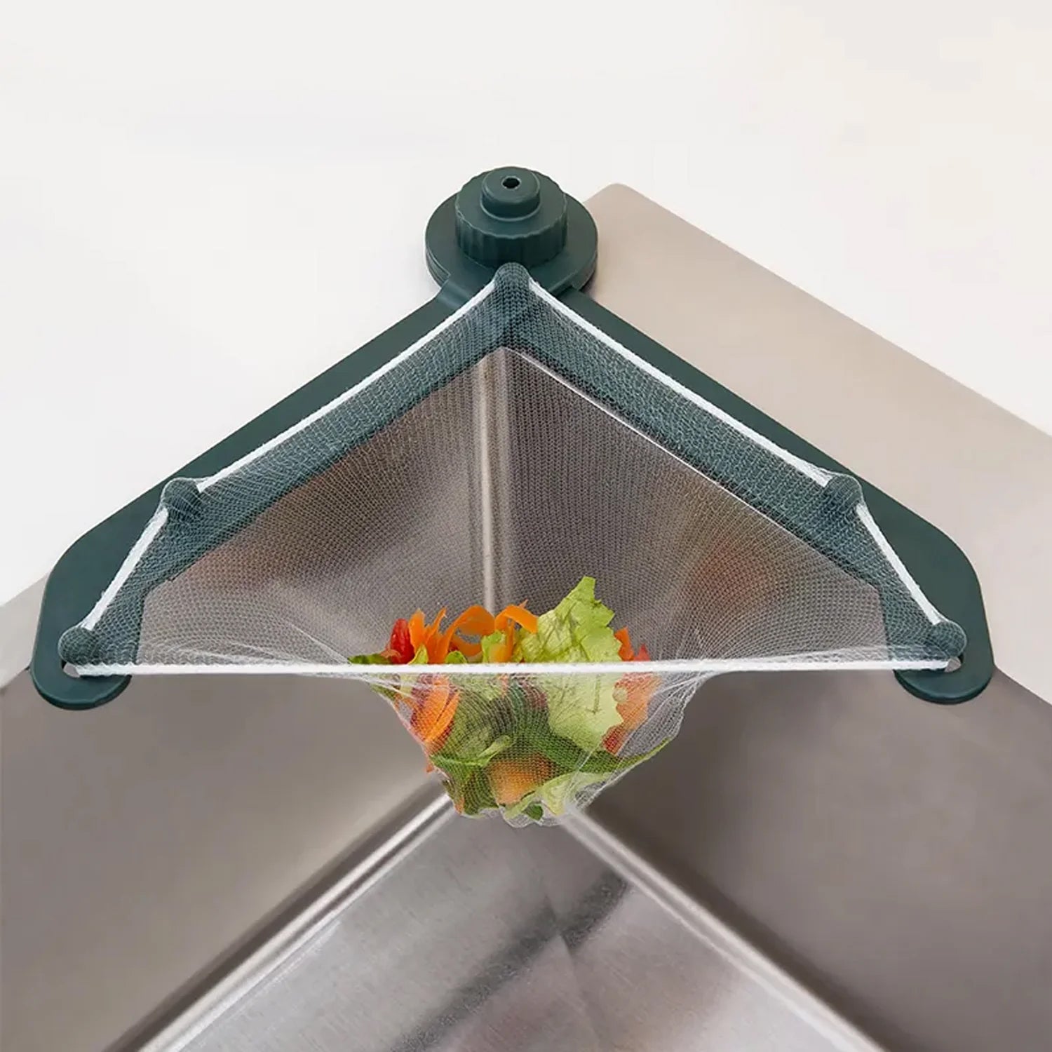Wukusy kitchen sink filter basket capturing food residue, hair, and paper scraps, designed to fit standard kitchen sinks for practical drainage.