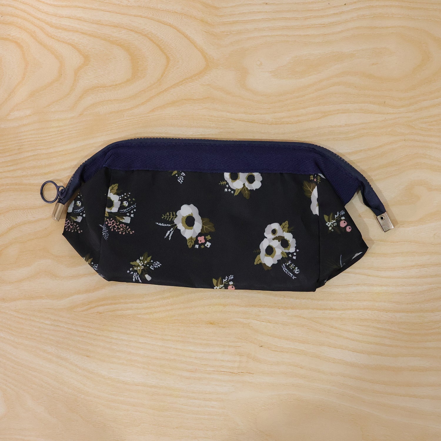Wukusy stylish multipurpose cosmetic storage pouch bag, 18x12 cm, with a sleek design and multiple compartments for makeup and toiletries.