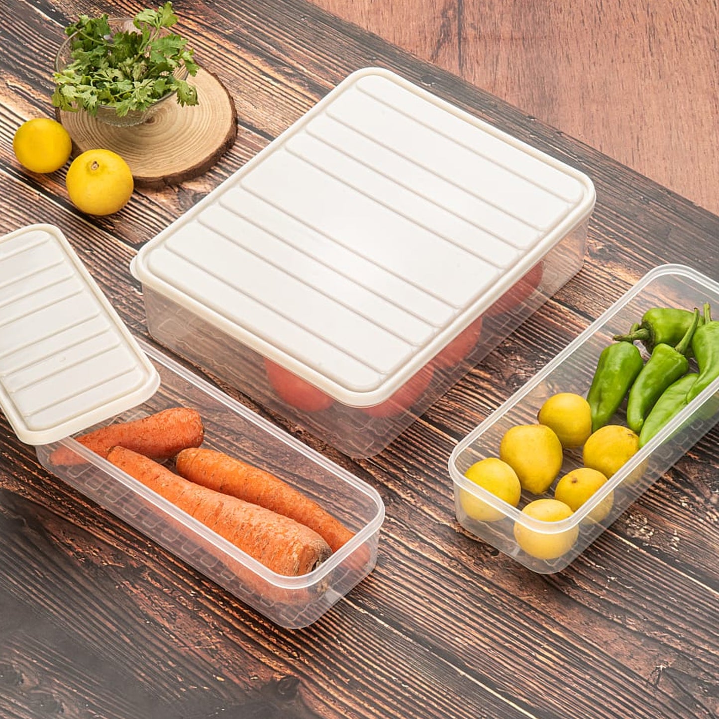 Wukusy 3-pack plastic food storage containers with lids, stackable fridge organizers for vegetables and freezer storage.