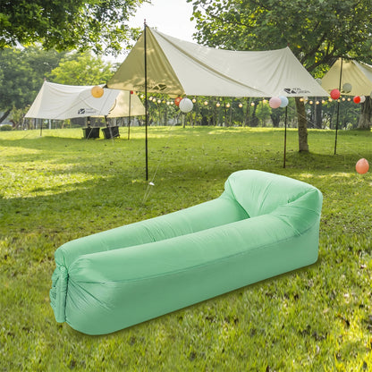 Wukusy foldable inflatable air sofa lounger spread out with blue fabric and built-in handles, ideal for outdoor relaxation.