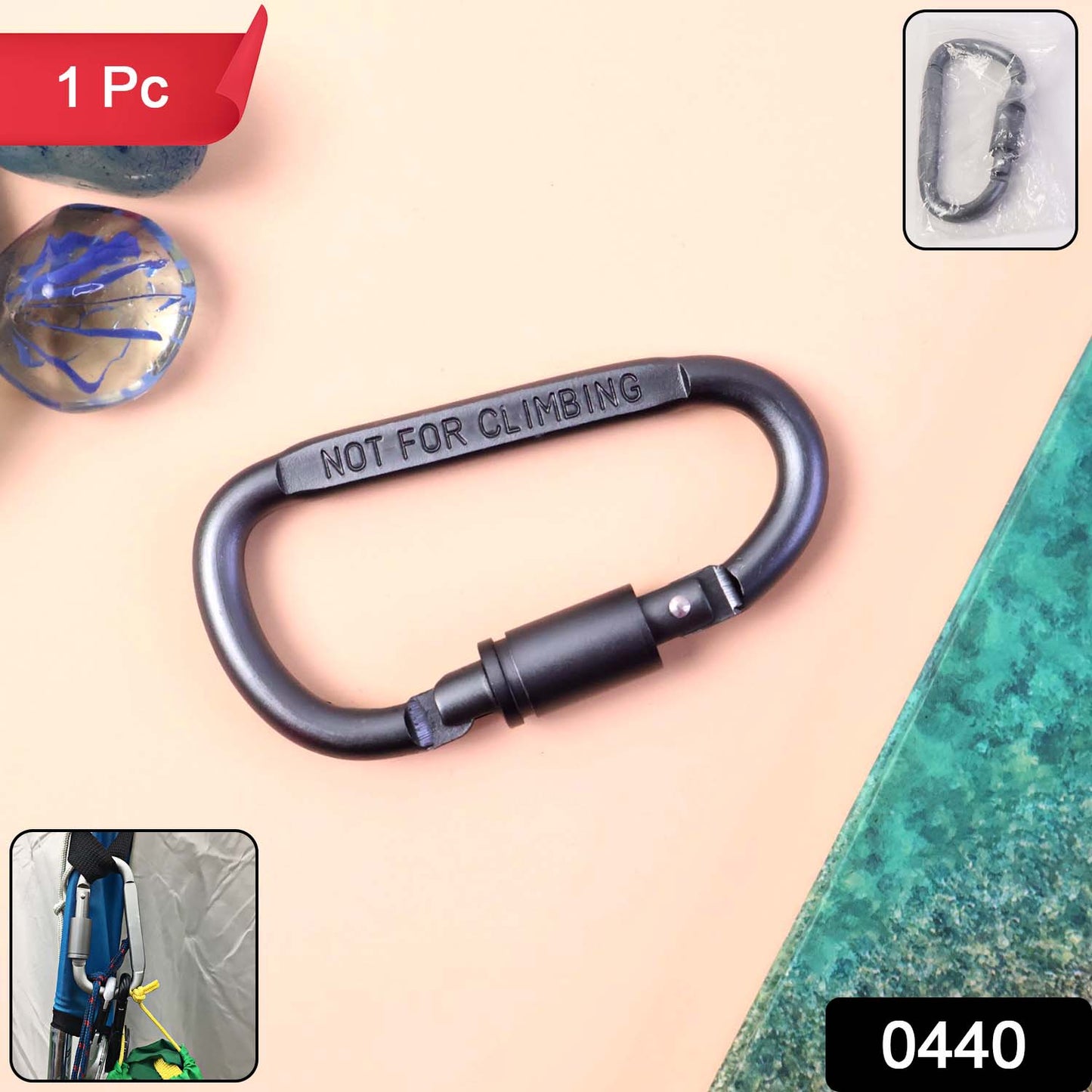 Heavy-duty metal carabiner hook with screw lock, Wukusy brand, used for home improvement, shown in close-up with secure locking mechanism.