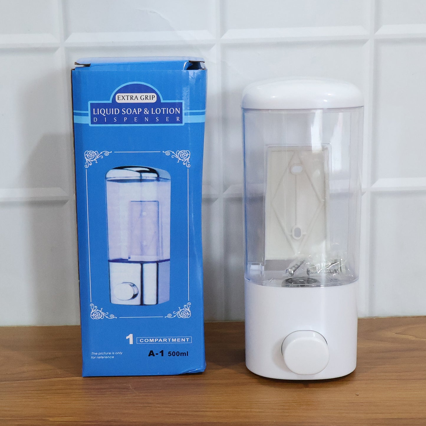 Wukusy wall mount liquid soap and hand wash dispenser, 500 ml capacity, mounted on a bathroom wall with a pump nozzle visible.