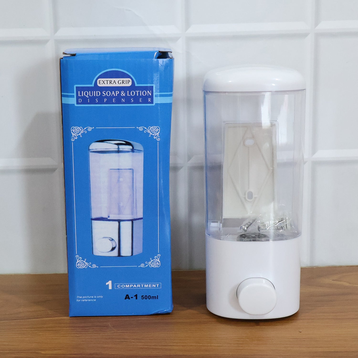 Wukusy wall mount liquid soap and hand wash dispenser, 500 ml capacity, mounted on a bathroom wall with a pump nozzle visible.