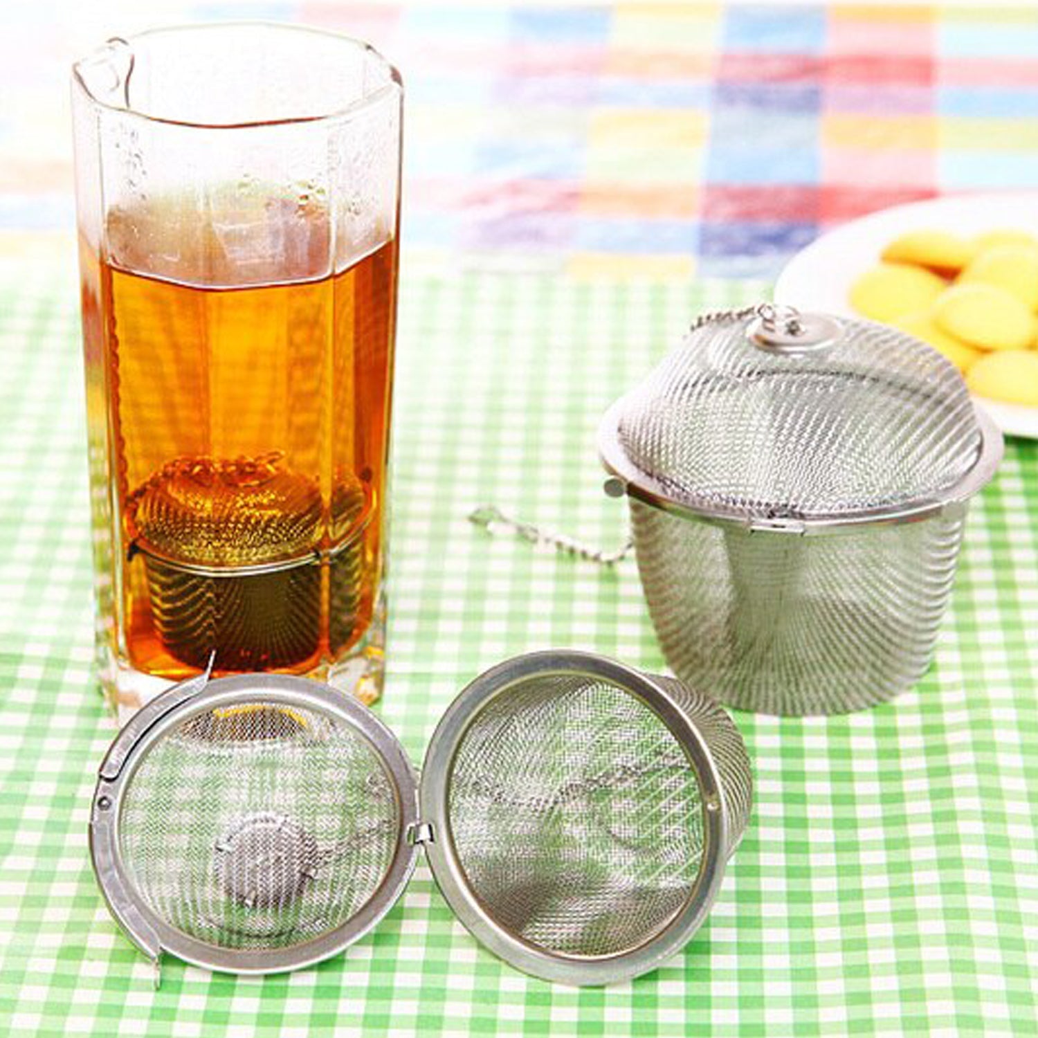 Wukusy 2744 Ss Easy Tea Filter for filtering loose tea in kitchen and household use, made of stainless steel with fine mesh.