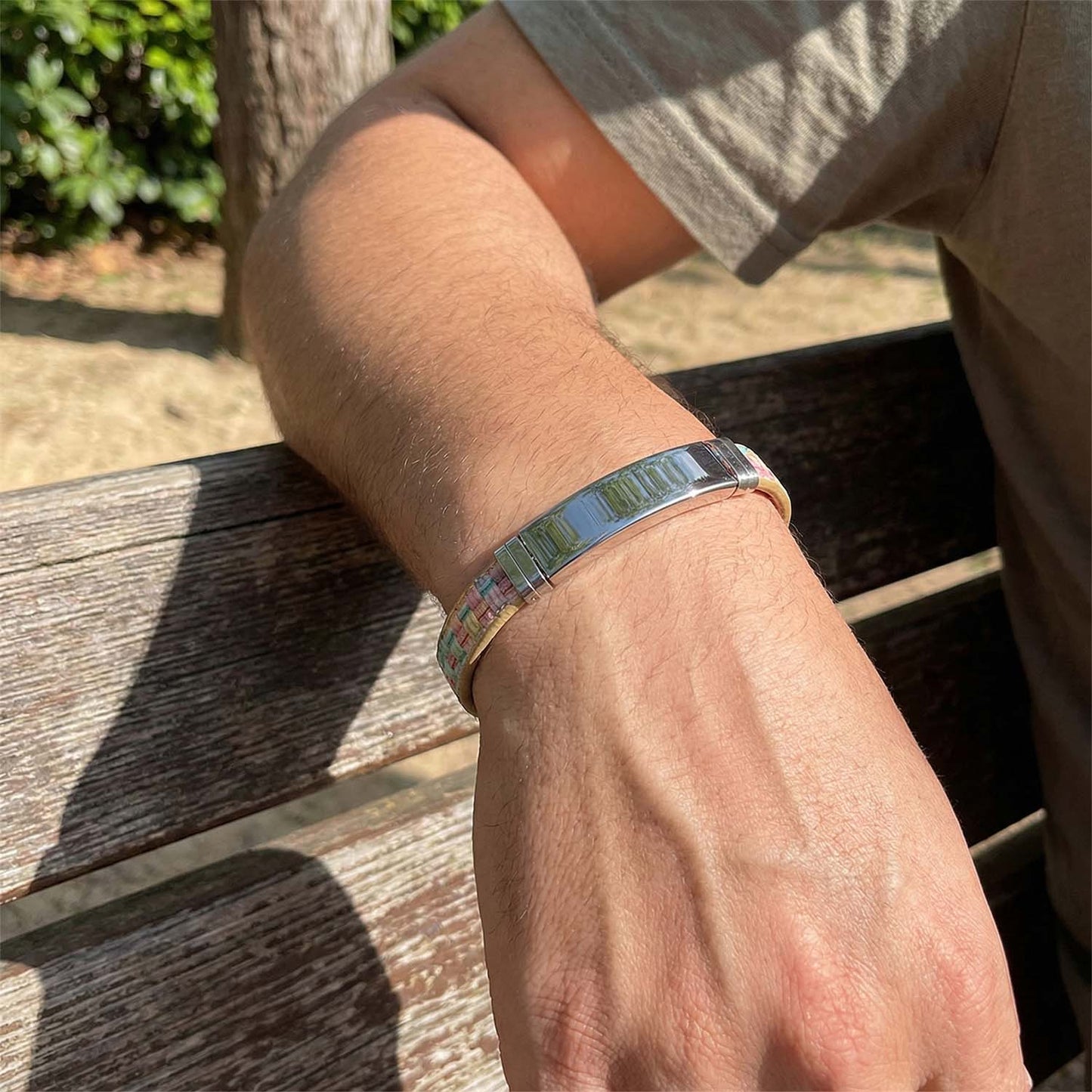 Wukusy premium fancy wrist bracelet with multicolor woven design, showcasing intricate colorful patterns on a stylish accessory.