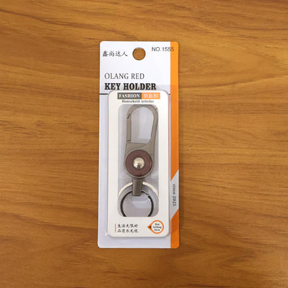 Wukusy premium metal key holder with dual rings and secure clip, compact and durable for organizing keys.
