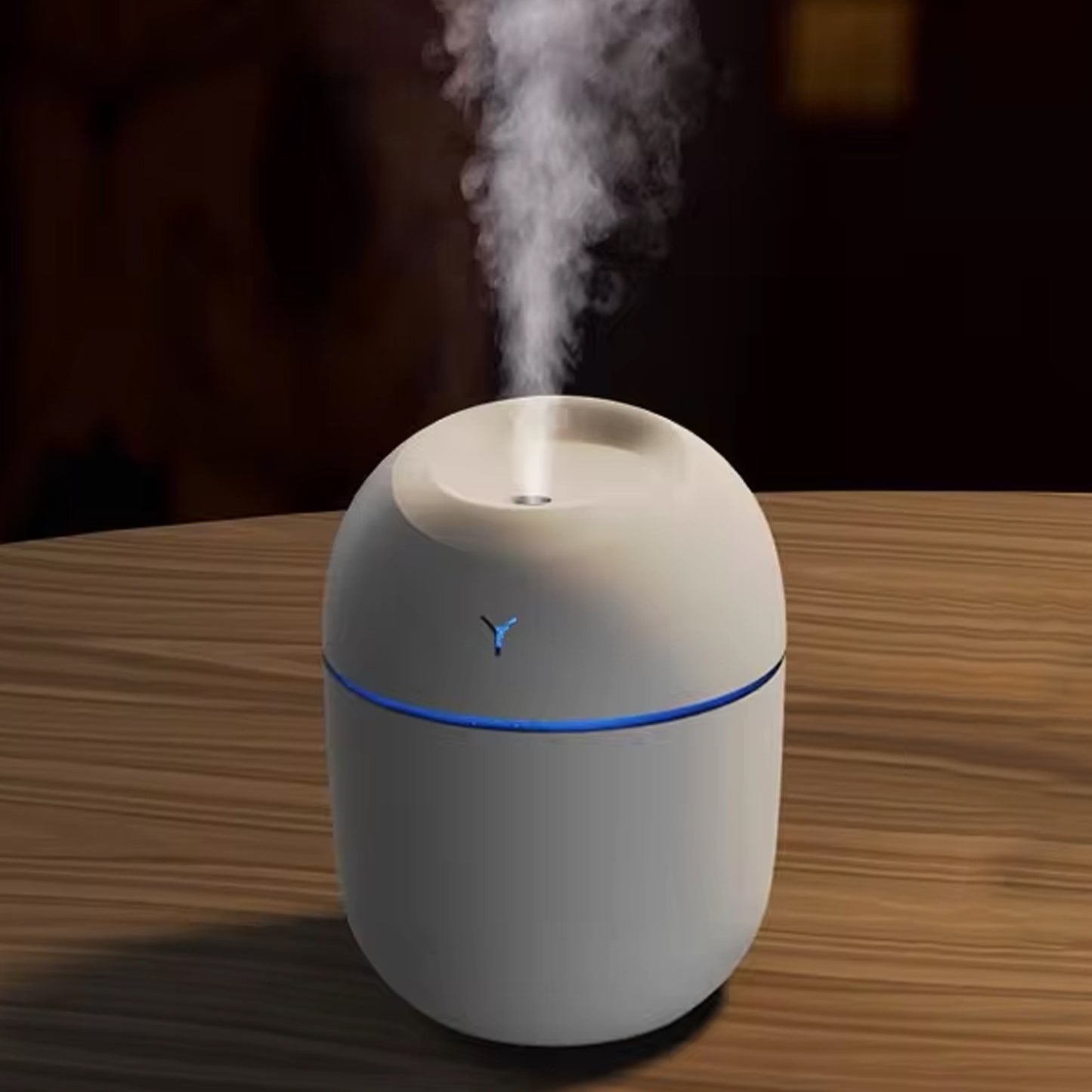 Wukusy plastic office humidifier with aromatherapy feature, 220ml capacity, shown on a desk with mist and control panel.