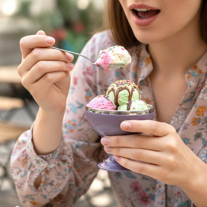 Six stainless steel dessert bowls with a stand, Wukusy 6-piece set for serving sweets and snacks in a modern kitchen display.