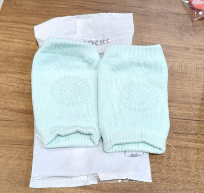 Mint green toddler wool knit leg warmer with knee guard, baby care accessory by Wukusy, soft and cozy for little ones.