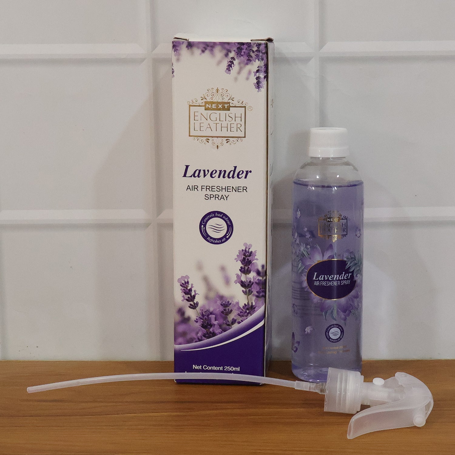 Wukusy Next Premium English Leather lavender air freshener spray bottle, 250ml, with a sleek design and lavender scent label.