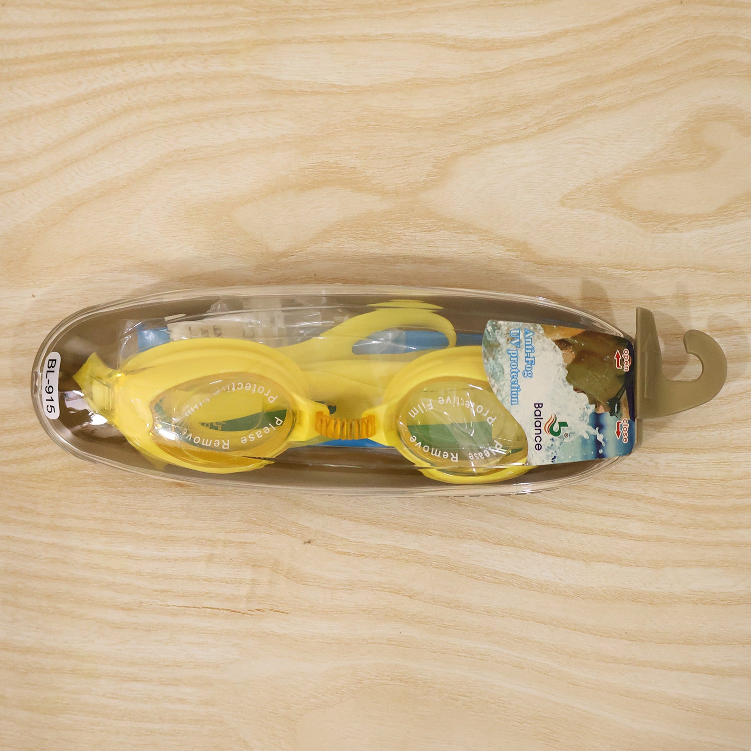 Kids colorful swimming goggles with anti-leak seal and adjustable strap, shown in a vibrant, playful design.