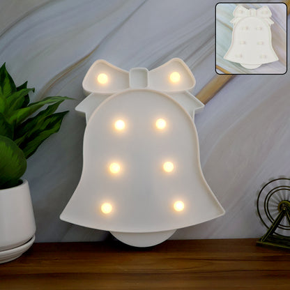 Wukusy bell-shaped LED decorative night light for home decor, featuring a soft glow and unique bell design.