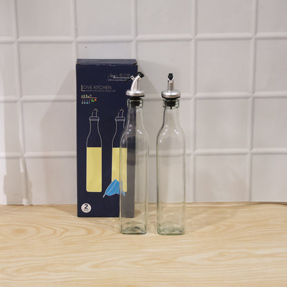 Wukusy glass oil dispenser bottles set with transparent leak-proof design for olive oil and vinegar, kitchen condiment storage.