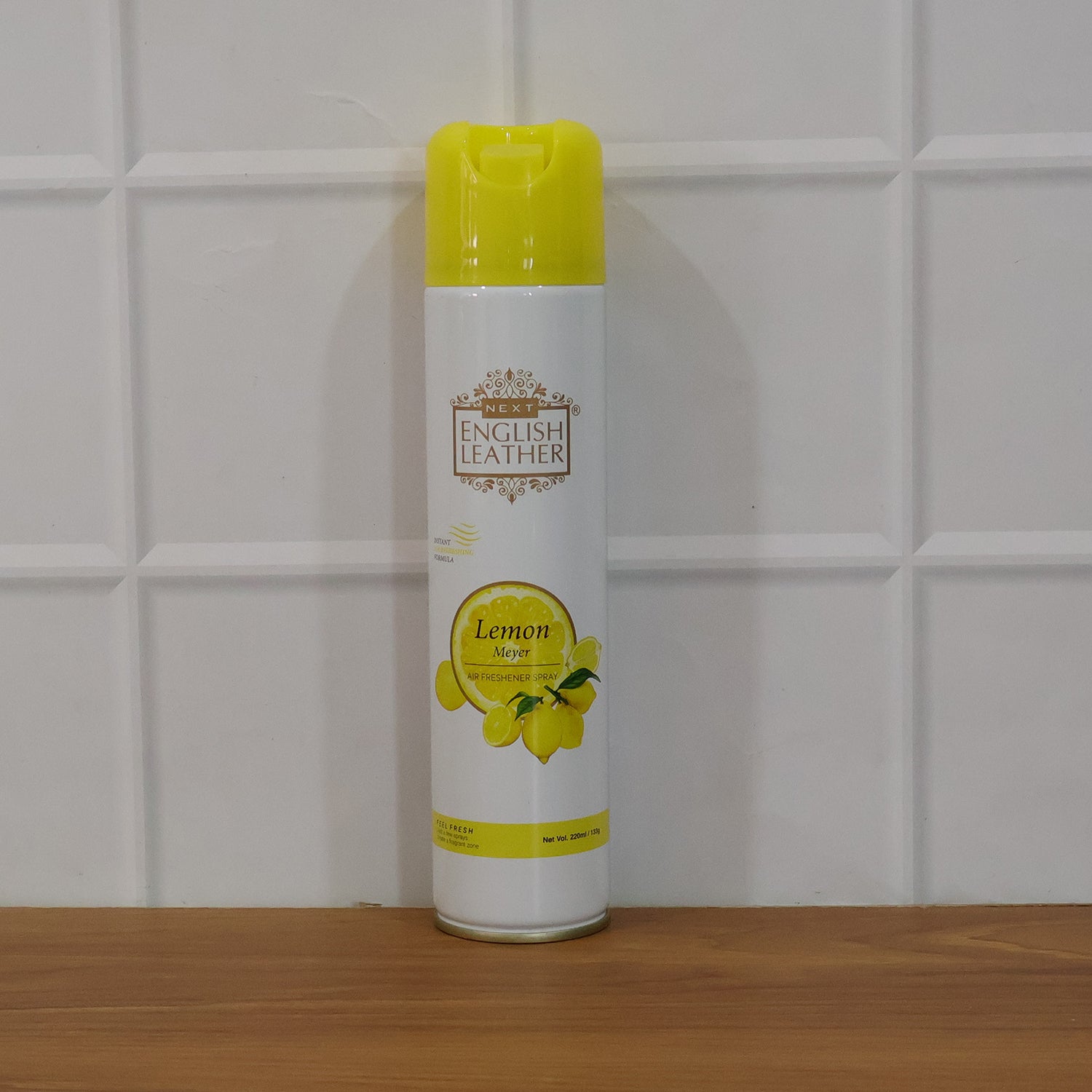 Next Premium English Leather Lemon air freshener spray by Wukusy, 220ml bottle with a sleek design and fresh lemon scent.