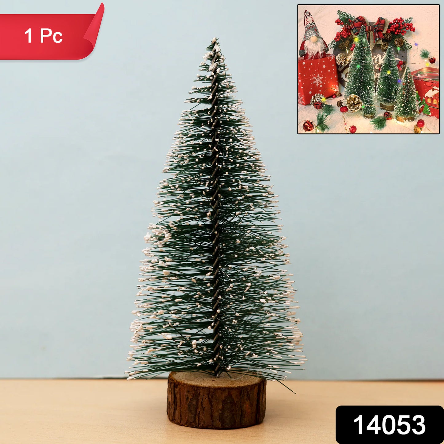 Mini artificial Christmas tree with snow effect by Wukusy, decorated with ornaments and pine branches for festive holiday decor