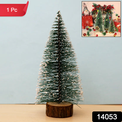 Mini artificial Christmas tree with snow effect by Wukusy, decorated with ornaments and pine branches for festive holiday decor