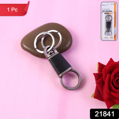 Wukusy premium dual ring metal key holder with rotating swivel, attached to keys on a keychain.