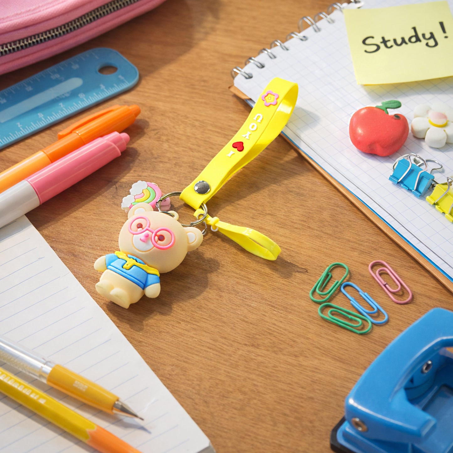 Wukusy cute cartoon teddy bear keychain with yellow "I Love You" strap, featuring a smiling teddy bear and heart design.