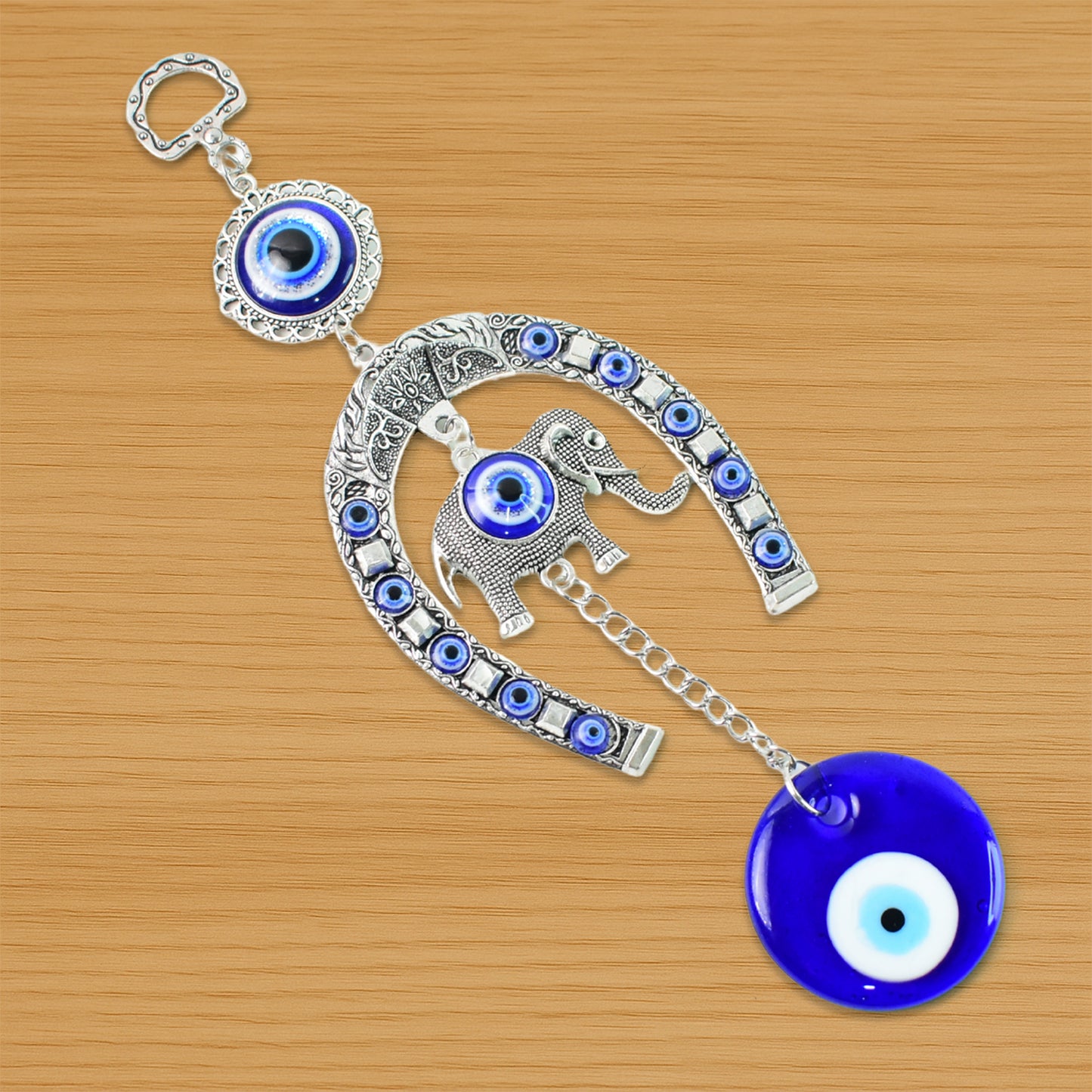Decorative evil eye wind chime with elephant and horseshoe motifs, featuring colorful beads and hanging design by Wukusy.