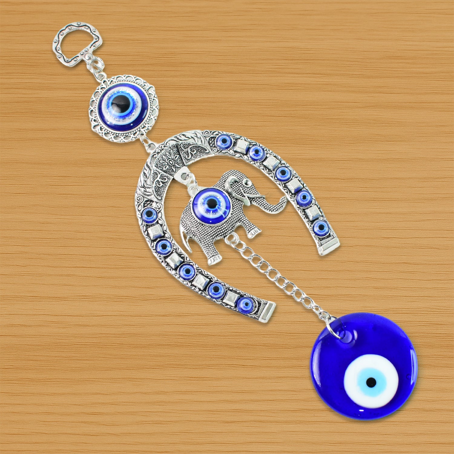 Decorative evil eye wind chime with elephant and horseshoe motifs, featuring colorful beads and hanging design by Wukusy.
