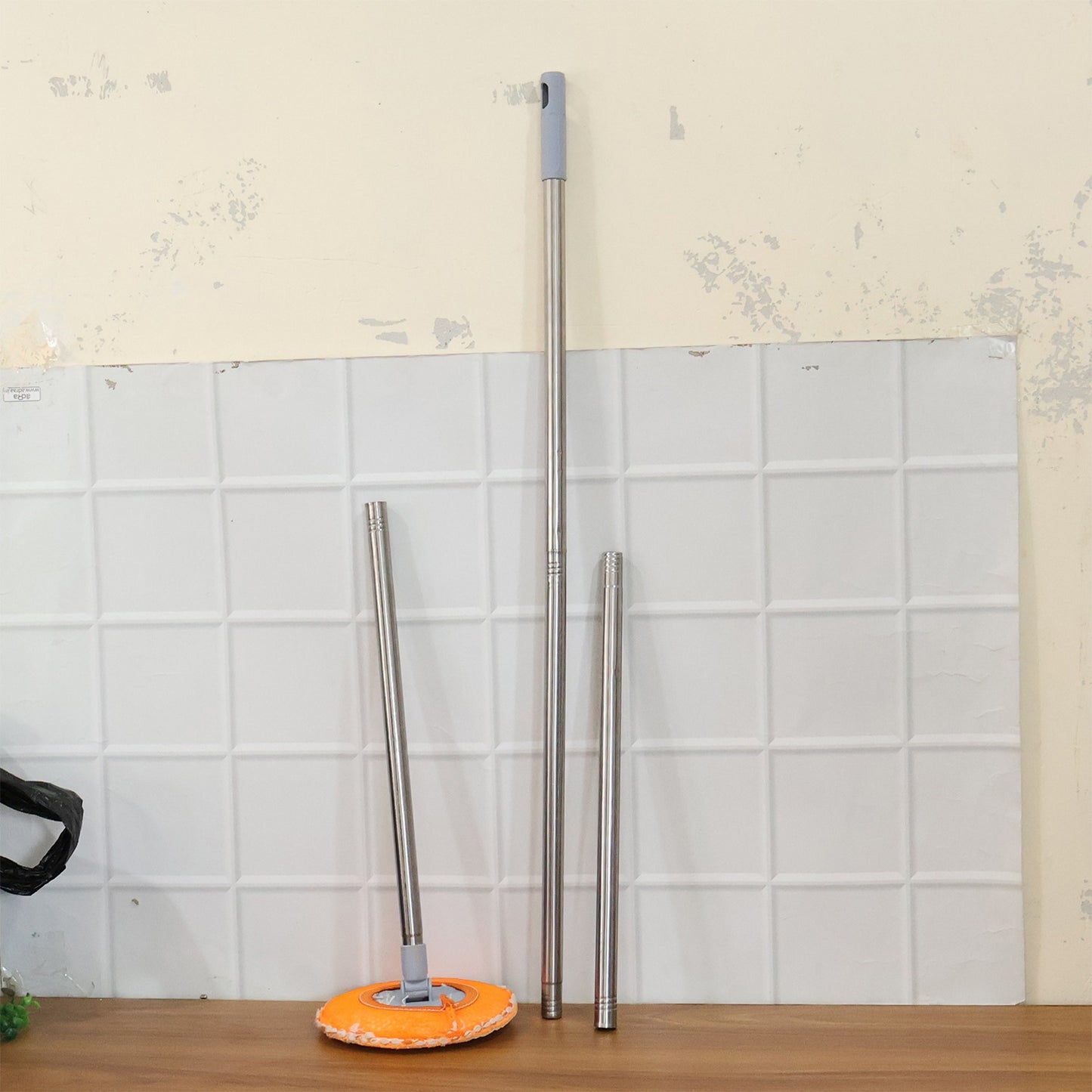 Wukusy multipurpose spin mop set with bucket and handle for easy cleaning of floors and surfaces.