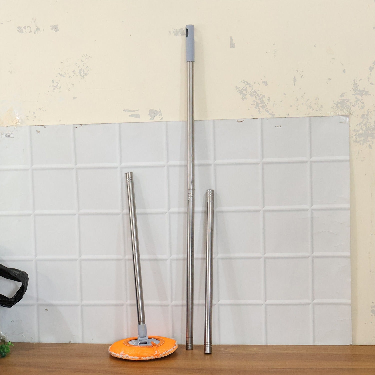 Wukusy multipurpose spin mop set with bucket and handle for easy cleaning of floors and surfaces.