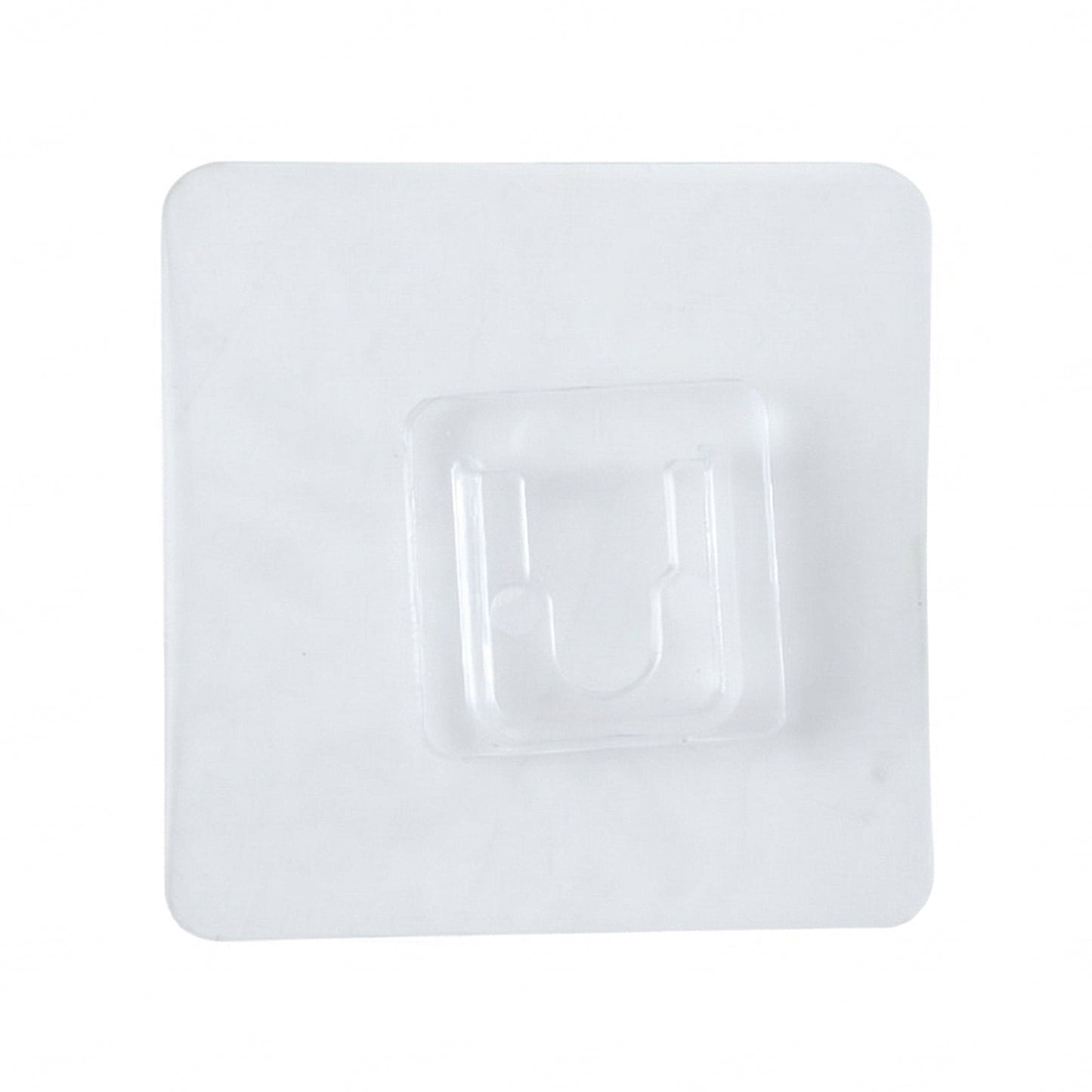 Clear self-adhesive wall hook by Wukusy attached to a wall, showing its transparent design and adhesive backing for easy hanging.