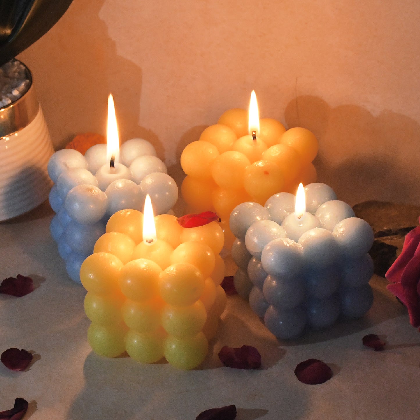 Set of four colorful cube-shaped wax candles, decorative home decor by Wukusy, perfect for adding vibrant ambiance.