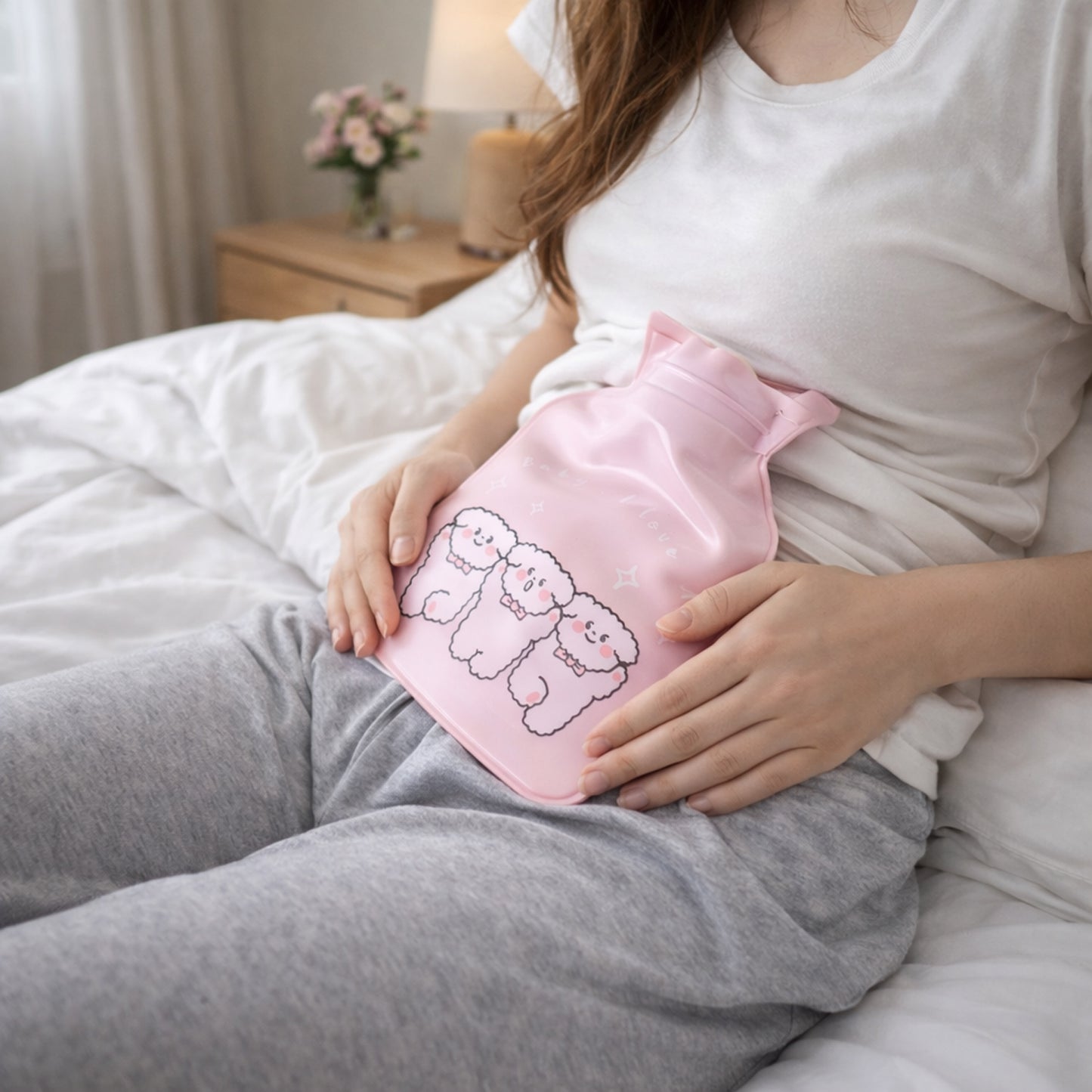 Cute printed mini Wukusy hot and cold water bag, 15x9 cm, with colorful design and soft fabric exterior.