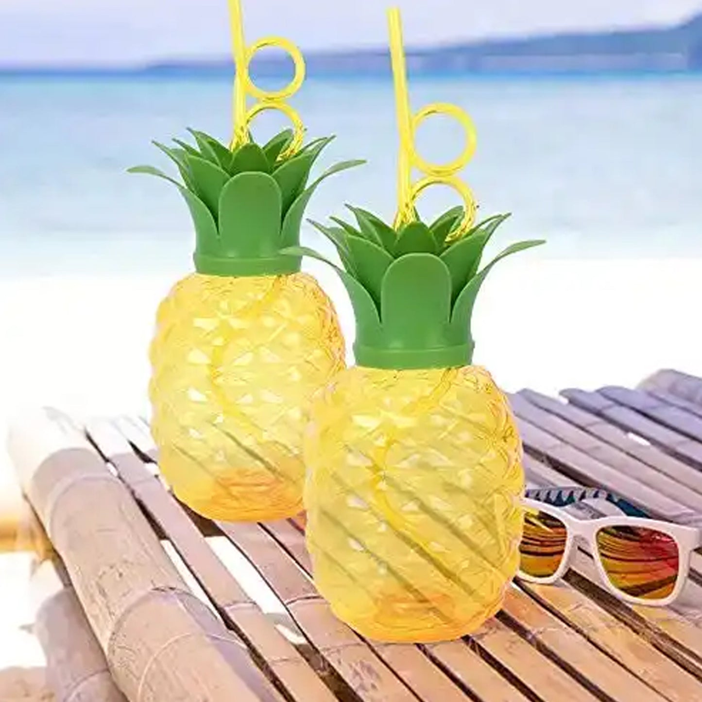 Wukusy plastic pineapple cup with straw, perfect for summer Hawaiian and beach party decorations, featuring a colorful pineapple design.