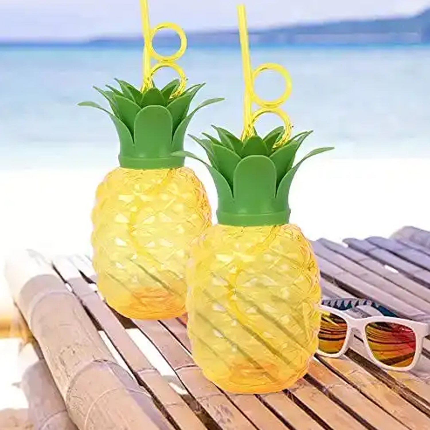 Wukusy plastic pineapple cup with straw, perfect for summer Hawaiian and beach party decorations, featuring a colorful pineapple design.