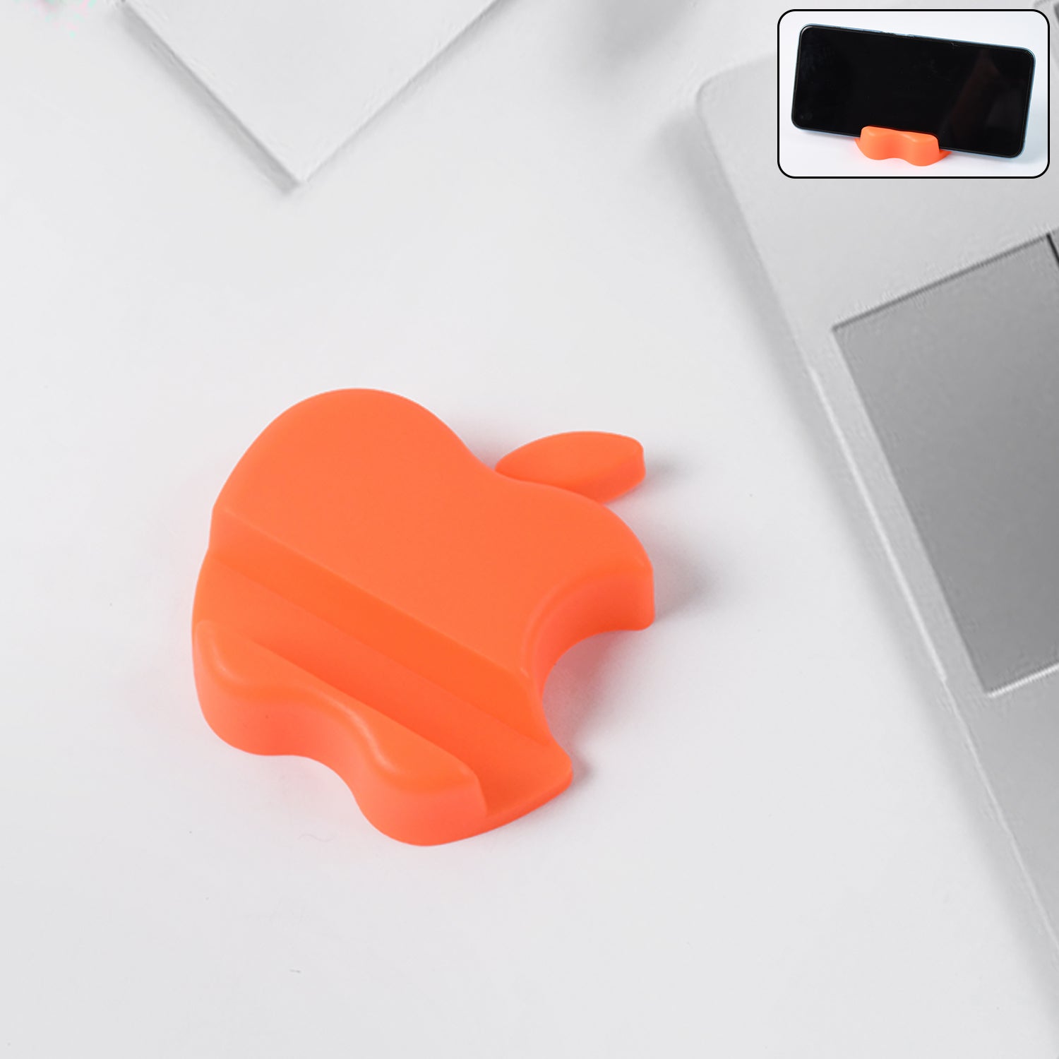 Colorful apple-shaped plastic mobile phone holder from Wukusy, displaying a vibrant, compact design for easy phone support.