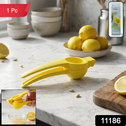 Wukusy Konvex Hand Press Plastic Lemon Squeezer shown with lemon half ready for juicing. Durable kitchen tool for fresh lemon juice extraction.