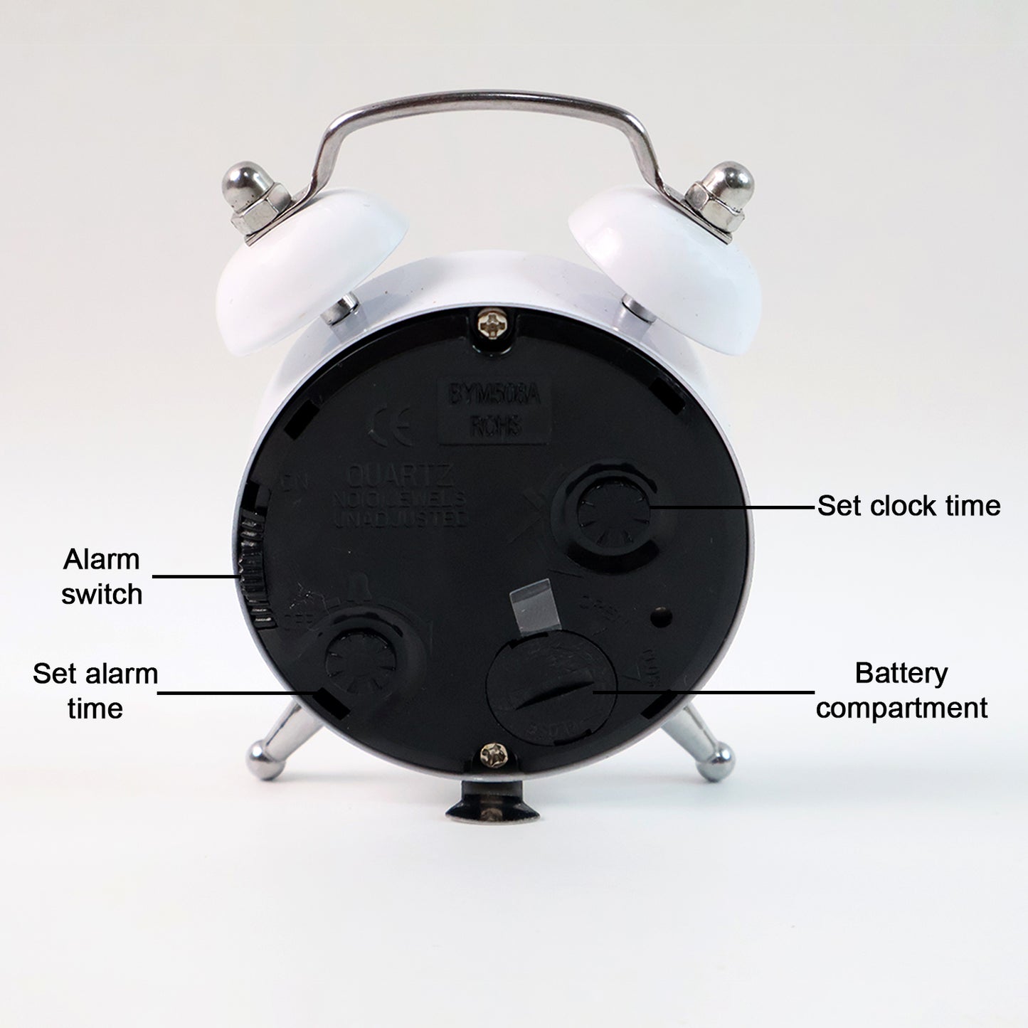 Small Wukusy twin-bell analog alarm clock with classic design, white face, black hands, and metal bells on top for home use.