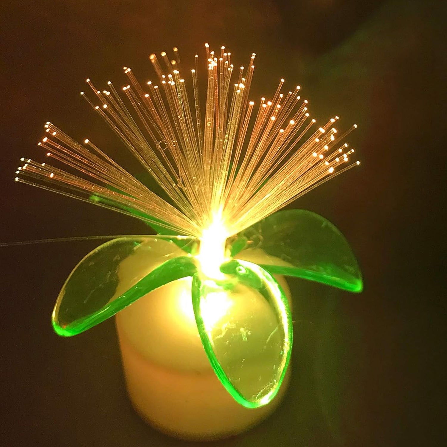 Set of 12 Wukusy fiber optic mini color-changing LED table centerpiece lights with light-up candles for home decor.
